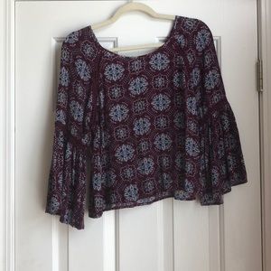 Purple top with flowy sleeves